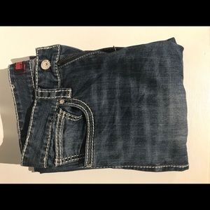 Rock ‘n’ roll light medium wash jeans take stitch